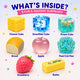 Assorted squishy toys including Cheese Cube, Snowflake Cube, Ocean Cube, Bread, Apple, Pearl Cat Paw, Strawberry, and Butter on a white background.