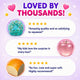 Product review graphic with text and images of a blue toy, pink apple, and orange item on a purple background.