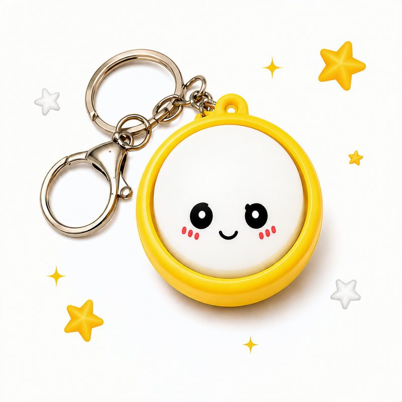 Keychain with a smiley face design on a white background