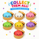Colorful bun-shaped toys with smiling faces in open brown containers on a white background.
