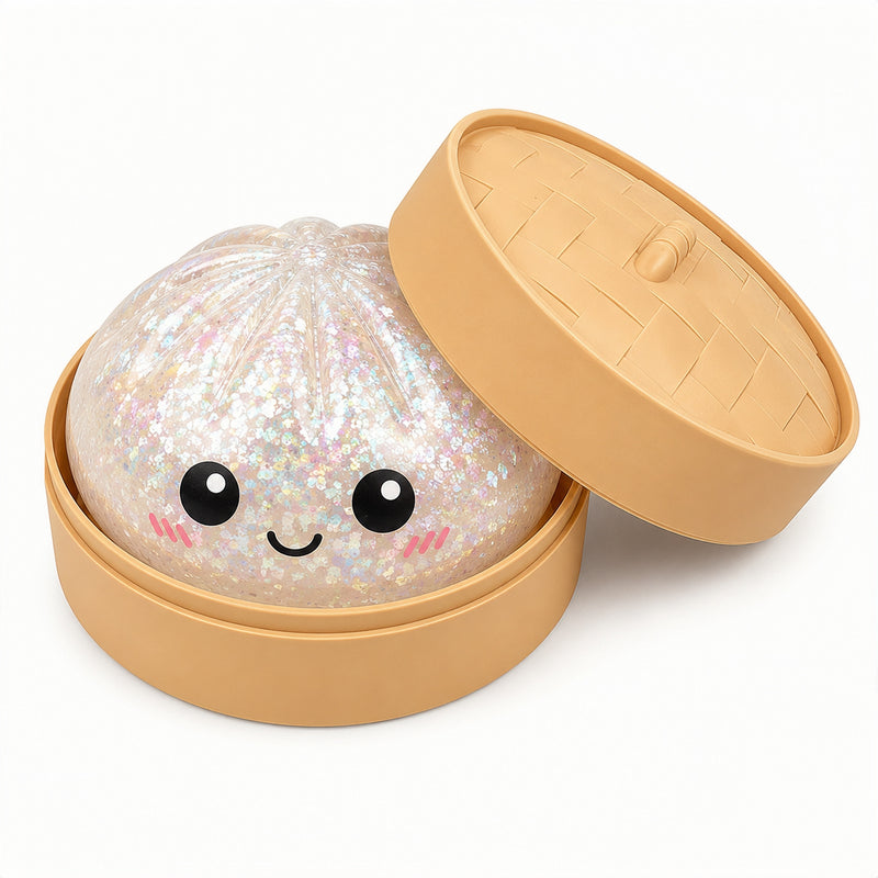 Sparkly ball with a smiley face in a tan container on a white background