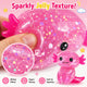 Pink glittery slime with axolotl toy and text highlighting texture and features.